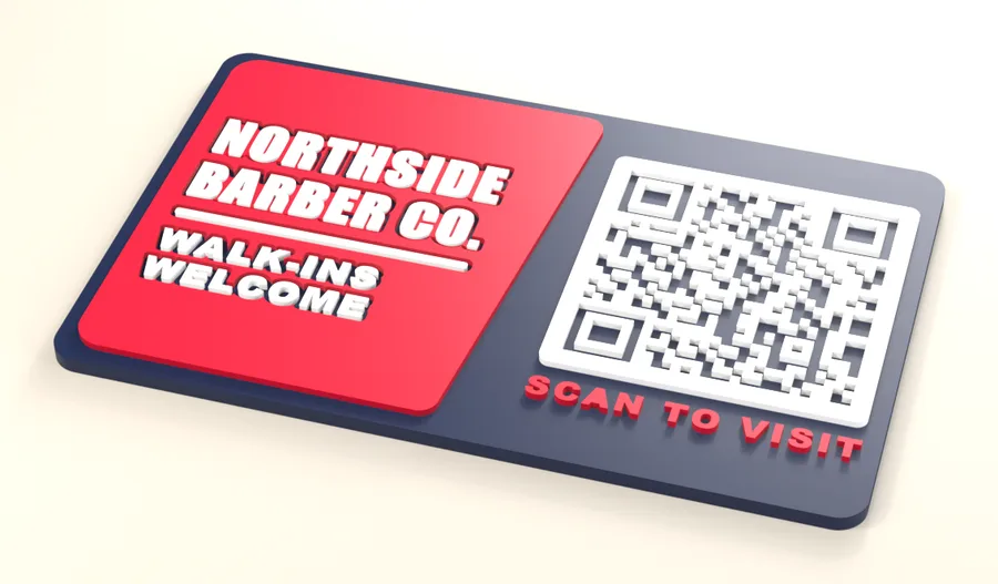 Navy and red 3D-printed business card with raised lettering and a QR code